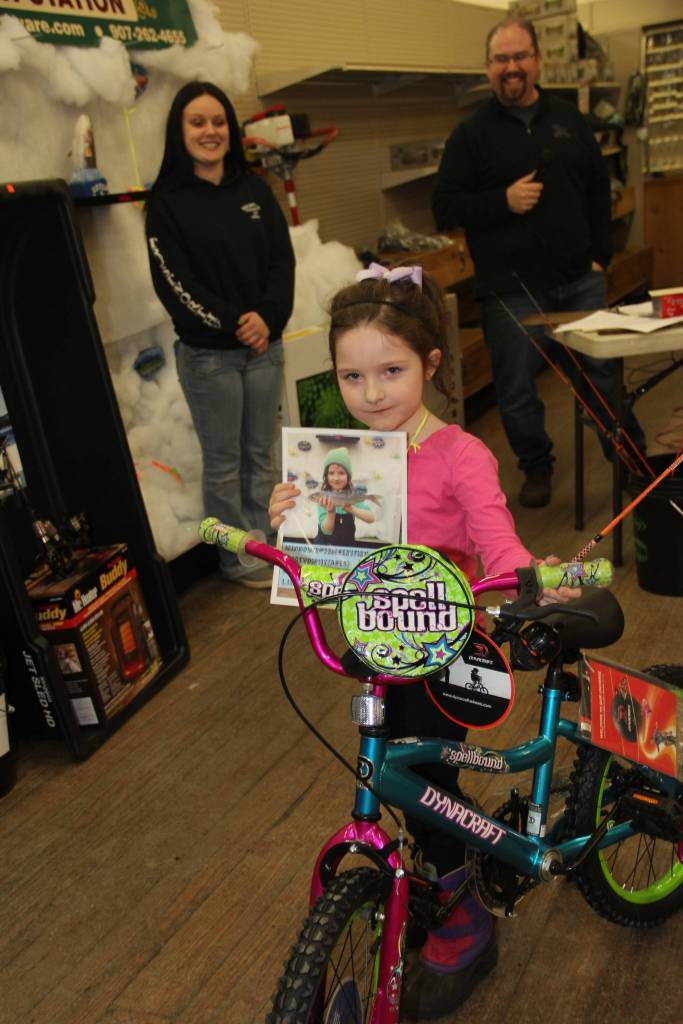 Alice Voight caught a fish and won a bike in the Ice Fishing Derby.