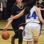 Ninilchik&rsquo;s DeeAnn White dribbles the ball down the court Wednesday in an opening round contest against Selawik&rsquo;s Davis Ramoth school at the Class 1A state basketball tournament at the Alaska Airlines Center in Anchorage. (Photo by Joey Klecka/Peninsula Clarion)