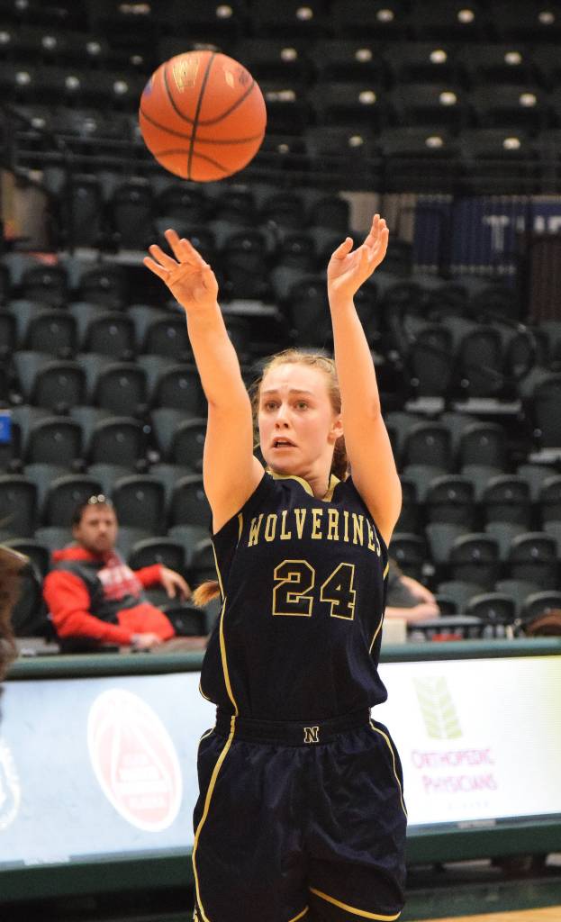 Ninilchik&rsquo;s Isabella Koch releases a 3-pointer Saturday against Kake in the Class 1A girls state tournament fourth-place game at the Alaska Airlines Center in Anchorage. (Photo by Joey Klecka/Peninsula Clarion)