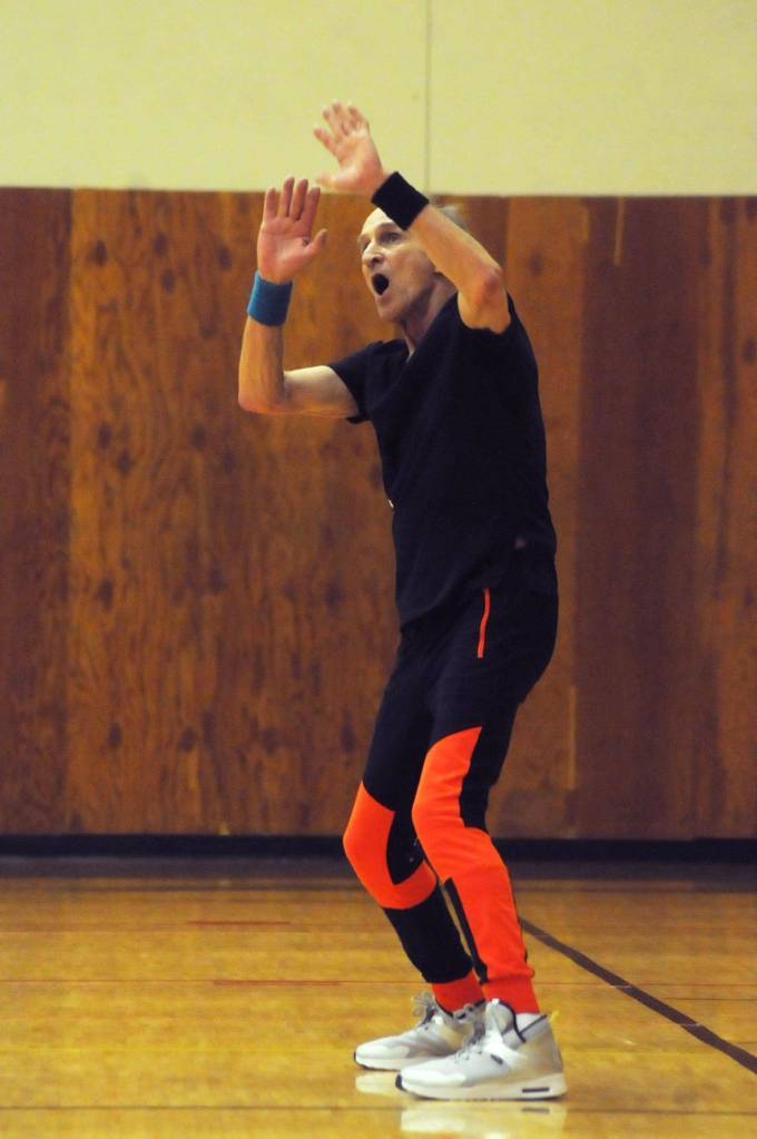 Zumba instructor Truman Krogel leads a class at the Kenai Recreation Center on Thursday, March 15, 2018 in Kenai, Alaska. Krogel, 74, said he first tried Zumba himself four years ago, loved it and began teaching classes of his own in January 2017. (Photo by Elizabeth Earl/Peninsula Clarion)