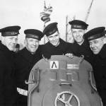 This Feb. 14, 1942 photo provided by the U.S. National Archives shows the five Sullivan brothers on board USS Juneau (CL-52) at the time of her commissioning ceremonies at the New York Navy Yard. The brothers who were all killed in the World War II sinking of the USS Juneau on Nov. 13, 1942. From left to right: Joseph, Francis, Albert, Madison and George Sullivan. Wreckage from the USS Juneau, a Navy ship sunk by the Japanese 76 years ago, has been found in the South Pacific. (U.S. National Archives via AP)