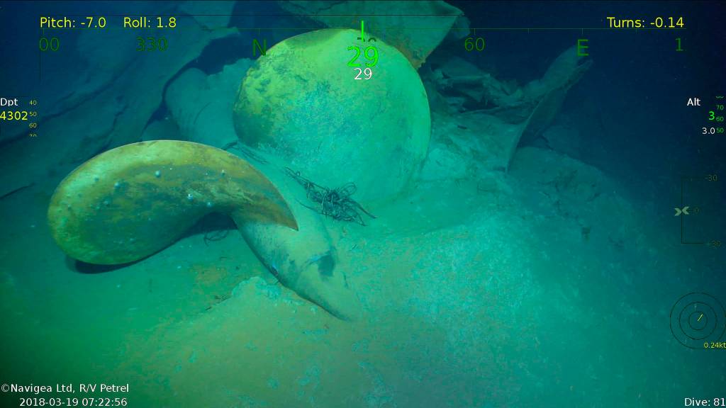 In this Monday, March 19, 2018, underwater video image courtesy of Paul Allen shows a propeller, part of wreckage from the USS Juneau, a U.S. Navy ship sunk by the Japanese torpedoes 76 years ago, found in the South Pacific. Philanthropist and Microsoft co-founder Allen has announced that wreckage of the sunken ship on which five brothers died in World War II has been discovered in the South Pacific. A spokeswoman for Allen confirms wreckage from the USS Juneau was found Saturday off the coast of the Solomon Islands. (Paul Allen via AP)