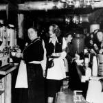 FILE - In this Feb. 9, 1944, file photo, Alleta Sullivan, left, mother of the five Sullivan brothers who lost their lives in the sinking of the cruiser USS Juneau, works alongside actress Marlene Dietrich as they serve servicemen in the USO Hollywood Canteen, Calif. Philanthropist and Microsoft co-founder Allen announced March 17, 2018 that wreckage of the sunken ship on which five brothers died in World War II has been discovered in the South Pacific. The ship was hit by Japanese torpedoes in 1942, killing hundreds of men, including the five Sullivan brothers from Waterloo, Iowa. (AP Photo/File)