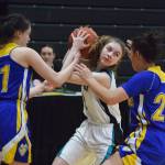 Nikiski&rsquo;s America Jeffreys looks for an open teammate Friday against Kotzebue at the Class 3A state tournament at the Alaska Airlines Center. (Photo by Joey Klecka/Peninsula Clarion)