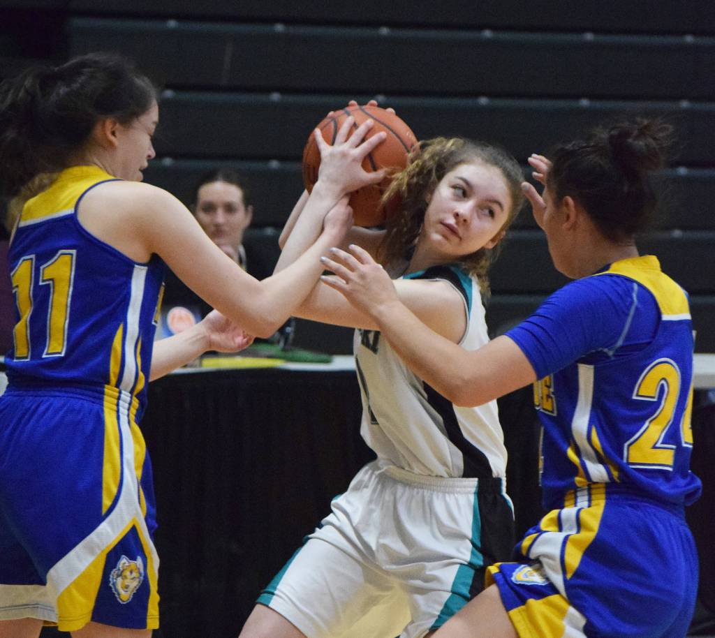 Nikiski&rsquo;s America Jeffreys looks for an open teammate Friday against Kotzebue at the Class 3A state tournament at the Alaska Airlines Center. (Photo by Joey Klecka/Peninsula Clarion)