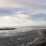 In this Jan. 18, 2018 photo, patchy ice floats near the mouth of the Kenai River in Kenai, Alaska. Most of Alaska experienced a warmer, wetter winter than average from 2017&