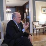 In this March 13 photo, Gov. Bill Walker speaks by phone to a reporter not physically present for a media availability at the governor&rsquo;s mansion in Juneau. (AP Photo/Becky Bohrer)