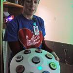 Ruthann Truesdell, Heritage Place staff training coordinator, discusses an interface that residents can use to change the lighting in the home&rsquo;s new Snoezelen room, which provides an interactive relaxation experience for residents, on March 23 in Soldotna. (Photo by Erin Thompson/Peninsula Clarion)