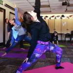 Students practice yoga during the final period of their school day in a class led by Lisa Wells on Friday. (Photo by Kat Sorensen/Peninsula Clarion)