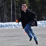 After catching a model rocket as it parachuted to Earth, Asa Lorentzen returns to the launch site during Scott Aleckson&rsquo;s model rocketry class in the parking lot of the Soldotna Regional Sports Complex in Soldotna on Saturday. Aleckson said he made and launched his first plastic, balsa wood, and cardboard rocket as a 4th grade student at Soldotna Elementary School. Since then he&rsquo;s built a custom launch system, he said, &ldquo;with recycled electronics and a lot of soldering time.&rdquo; Aleckson taught Saturday&rsquo;s rocketry class through the Soldotna Community Schools program, and would like to continue spreading the hobby. &ldquo;If I could get a model rocket club going, that&rsquo;d be great,&rdquo; he said. &ldquo;Stuff like this is much more fun in a group.&rdquo; (Photo by Ben Boettger/Peninsula Clarion)