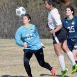 Nikiski&rsquo;s Deidra Lamping heads the ball wide of the goal as Redington goalie Grace Rushing and defender Courtney Crocket look on Friday, May 12, 2017, at Nikiski High School. (Photo by Jeff Helminiak/Peninsula Clarion) Nikiski&rsquo;s Deidra Lamping heads the ball wide of the goal as Redington goalie Grace Rushing and defender Courtney Crocket look on May 12, 2017, at Nikiski High School. (Photo by Jeff Helminiak/Peninsula Clarion)