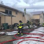 Central Emergency Services firefighters work to extinguish a blaze in an apartment building on Cork Line Drive in the Kalifornsky Beach area on Monday, April 9, 2018 near Kenai, Alaska. No one was reportedly hurt in the blaze, and the cause of the fire is still under investigation. (Photo courtesy Roy Browning/Central Emergency Services)