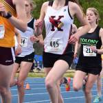 Kenai Central&rsquo;s Brooke Satathite races the Class 4A girls 1,600-meter event May 27, 2017, at the Alaska state track & field championships at Palmer High School. (Photo by Joey Klecka/Peninsula Clarion)