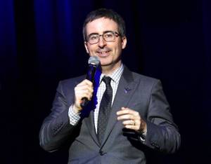 In this Nov. 10, 2015 file photo, John Oliver performs at the 9th Annual Stand Up For Heroes event in New York. John Oliver of HBO&rsquo;s &ldquo;Last Week Tonight&rdquo; is trying to give one of the last Blockbuster Video locations in the world in Alaska a little help in drawing customers instead of streaming movies online. Oliver offered Sunday, April 15, 2018, to send the store the jockstrap that Russell Crowe wore in &ldquo;Cinderella Man&rdquo; and other movie clothing obtained by the show at a celebrity auction. (Photo by Greg Allen/Invision/AP, File)