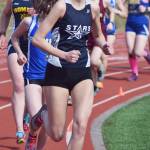 Soldotna senior Kellie Arthur leads a pack of runners in the girls 1,600 meters Saturday afternoon at Homer High School. (Photo by Joey Klecka/Peninsula Clarion)