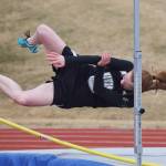 Nikiski freshman Bailey Epperheimer grazes the bar in the girls high jump Saturday afternoon at Homer High School. (Photo by Joey Klecka/Peninsula Clarion)