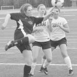Nikiski&rsquo;s Angela Druesdow clears the ball out of danger against Kenai Central on Monday at Kenai Central High School. (Photo by Jeff Helminiak/Peninsula Clarion)