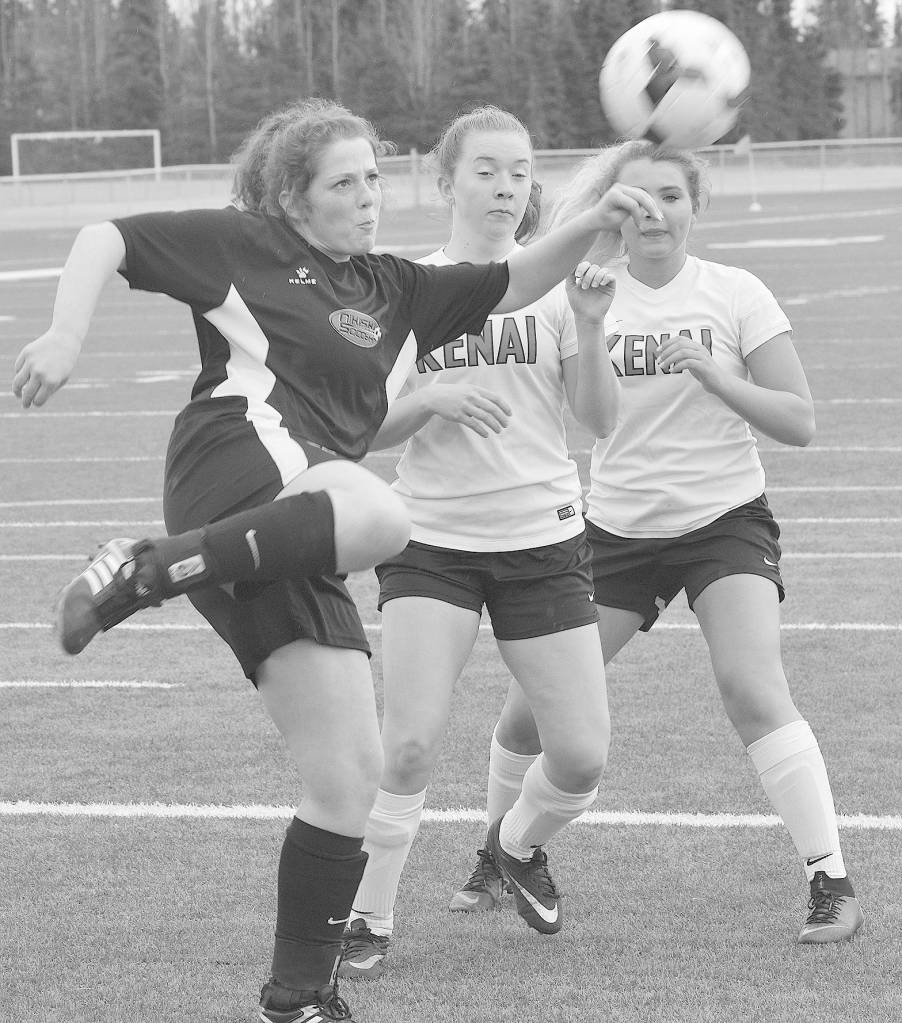 Nikiski&rsquo;s Angela Druesdow clears the ball out of danger against Kenai Central on Monday at Kenai Central High School. (Photo by Jeff Helminiak/Peninsula Clarion)