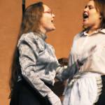 Governess Ms. Andrews (played by Sarah Nash) lectures one of the Banks&rsquo; family&rsquo;s maids (played by Treasa Cooper) during a dress rehearsal for Nikiski Middle-High School&rsquo;s production of &ldquo;Mary Poppins&rdquo; on Monday, April 23, 2018 in Nikiski, Alaska. The play premiers Friday at 7 p.m. at the high school. Tickets are $15. (Photo by Elizabeth Earl/Peninsula Clarion)