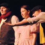 One of the chimneysweeps speaks to Jane Banks (played by Leora McCaughey) during a dress rehearsal for Nikiski Middle-High School&rsquo;s production of &ldquo;Mary Poppins&rdquo; on Monday, April 23, 2018 in Nikiski, Alaska. The play premiers Friday at 7 p.m. at the high school. Tickets are $15. (Photo by Elizabeth Earl/Peninsula Clarion)