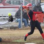Kenai Central&rsquo;s Alyssa Stanton swings through a pitch Thursday evening against Kodiak at Steve Shearer Memorial Ball Park in Kenai. (Photo by Joey Klecka/Peninsula Clarion)