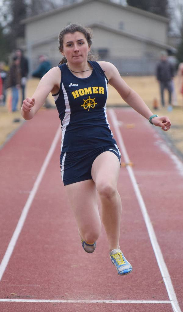 Homer sophomore Marina Carroll focuses during the girls triple jump Saturday at the Kenai Invitational at Ed Hollier Field. (Photo by Joey Klecka/Peninsula Clarion)
