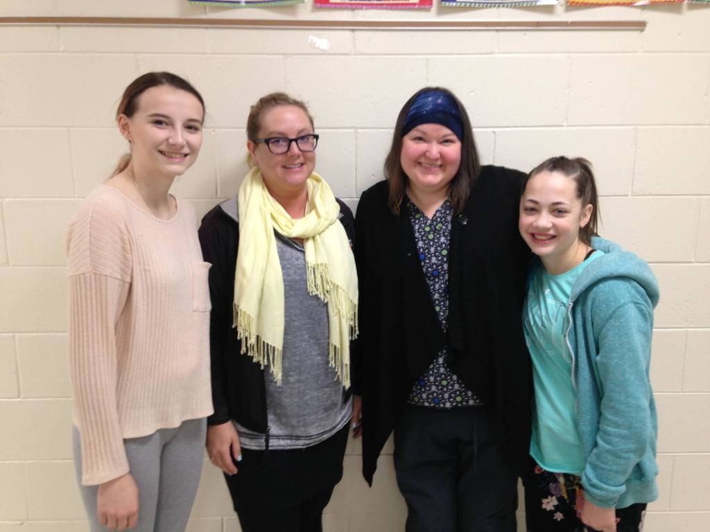 Hermoine and her partner Milena Doyle planning for their &ldquo;Don&rsquo;t get MAD!&rdquo; presentations. They met with school counselor Sammie Johnson and school nurse Dixie St. John.
