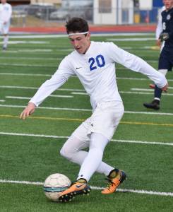 Soldotna&rsquo;s Josh Hieber directs the ball towards the Homer goal Thursday afternoon in a Peninsula Conference contest at Soldotna High School. (Photo by Joey Klecka/Peninsula Clarion)