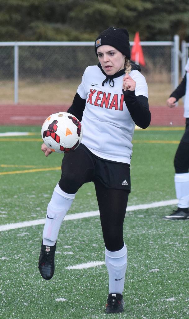 Kenai defender Alyssa Maw juggles the ball Saturday in a conference game against Grace Christian at Kenai Central High School. (Photo by Joey Klecka/Peninsula Clarion)