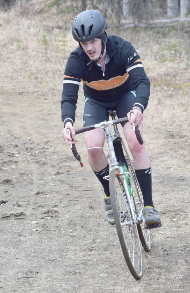 Mark Beeson rounds a corner Sunday, May 6, 2018, during May Cross at Tsalteshi Trails. (Photo by Jeff Helminiak/Peninsula Clarion)