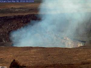 This Sunday, May 6, 2018, image from a research camera mounted in the observation tower at the Hawaiian Volcano Observatory and provided by the U.S. Geological Survey, shows the summit of the Kilauea volcano on the Big Island of Hawaii. The camera is looking south southeast towards the active vent in Halema&