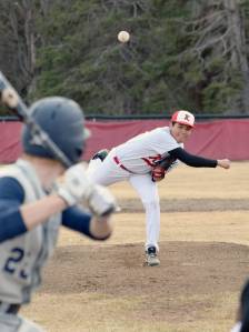 Kenai Central starter Carlos Caballero delivers to Soldotna&rsquo;s Jeremy Kupferschmid on Tuesday, May 7, 2018, at the Kenai Little League fields. (Photo by Jeff Helminiak/Peninsula Clarion)