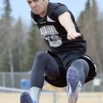 Nikiski&rsquo;s Jack Sullenger competes in the long jump Saturday, May 12, 2018, at the Kenai Peninsula Borough track and field meet at Soldotna High School. (Photo by Jeff Helminiak/Peninsula Clarion)