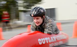 Alexander Van De Grift races in the Kenai Rotary Club&rsquo;s 12th anual Soapbox Derby on Saturday, May 12, 2018 at the Challenger Learning Center in Kenai, Alaska. Van De Grift won a craftsmanship trophy for his car, which was sponsored by Outlaw Body and Paint. (Ben Boettger/Peninsula Clarion).