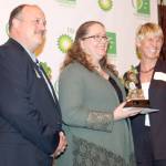 Supt. Sean Dusek and Wendy Lindskoog of BP congratulate Robanne Stading 2018 BP Teacher of the Year.