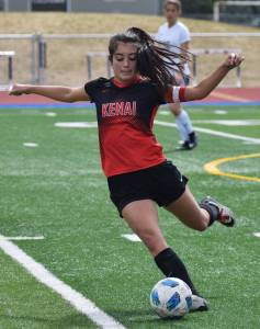 Kenai Central&rsquo;s Brenna Eubank winds up for a kick May 19, 2018, in the Peninsula Conference girls soccer championship at Soldotna High School. (Photo by Joey Klecka/Peninsula Clarion)