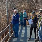 Beluga researcher Kim Ovitz (center, with sunglasses) and a group of volunteer whale-watchers look for belugas in the Kenai River on April 14, 2018 at Cunningham Park in Kenai, Alaska. 11 signed-up volunteers and several more casual ones helped Ovitz with her observations, which began March 15 and will continue until May 31. Her preliminary results suggest that a large portion of Cook Inlet&rsquo;s estimated 328 belugas travel the Kenai River with the tides in early spring. (Photo courtesy of Rickard Sjoeberg).