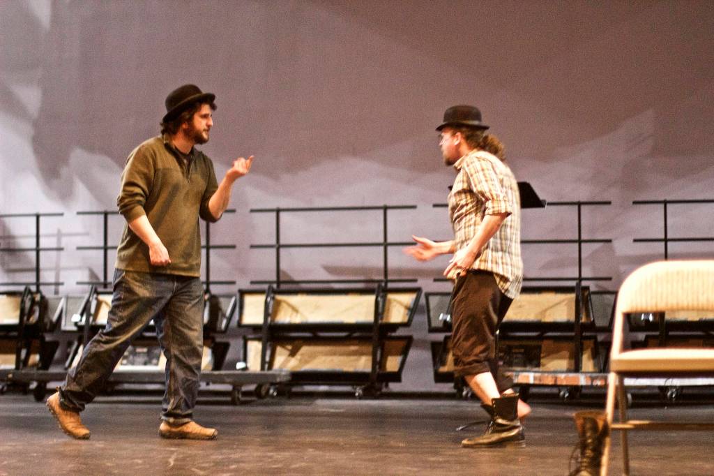 Peter Sheppard, left, and Matt Lees, right practice a scene from Samuel Beckett&rsquo;s &ldquo;Waiting for Godot.&rdquo; Sheppard directs the play, opening at 7 p.m. Friday, May 25, for the start of Pier One Theatre&rsquo;s 2018 season. (Photo by Richard Rose)