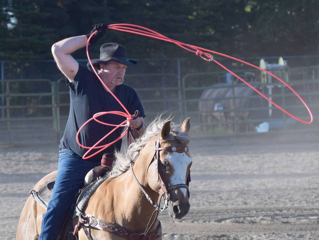 Tom Blazka practices a cattle roping routine Friday during events at the PCRS Rodeo at the Soldotna Rodeo Grounds. (Photo by Joey Klecka/Peninsula Clarion)