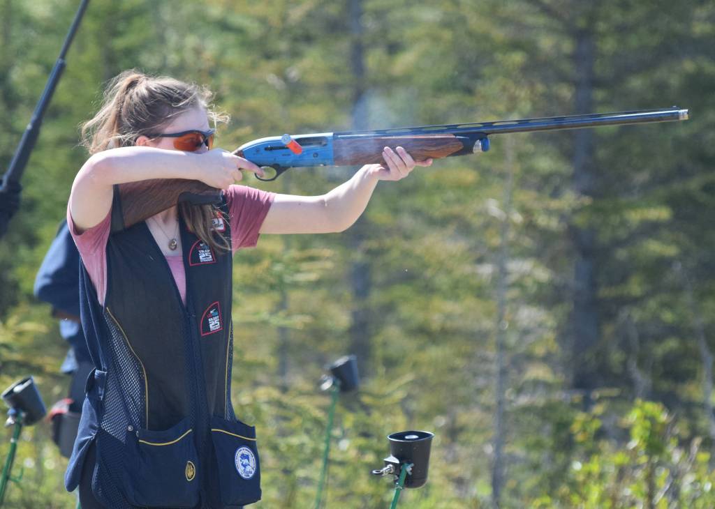 Soldotna shooter Emily Books takes a shot June 2 at a scholastic clay shooting event at the Snowshoe Gun Club in Kenai. (Photo by Joey Klecka/Peninsula Clarion)