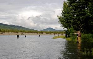 Anglers try their luck for sockeye salmon on the Kenai River near the Russian River confluence in this June 2016 photo on the Kenai National Wildlife Refuge, Alaska. As anglers head for the Kenai Peninsula, they&rsquo;ll see Stream Watch volunteers on the banks, educating the public on ways to preserve the river bank and prevent bear encounters. (Elizabeth Earl/Peninsula Clarion, file)