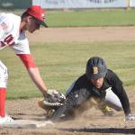 Oilers first baseman Michael Young applies a late tag to Dan Stankiewicz of the Anchorage Bucs in the second inning on Thursday, June 7, 2018, at Coral Seymour Memorial Park in Kenai. (Photo by Jeff Helminiak/Peninsula Clarion)