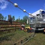 Stuffed salmon hang in a gillnet from the back of the &ldquo;F/V Sustainability&rdquo; display at the Alaska Seafood Marketing Institute&rsquo;s booth at the Kenai River Festival on Saturday, June 9, 2018 in Soldotna, Alaska. The annual festival, coordinated by the Kenai Watershed Forum, began Friday night and continues through Sunday. (Photo by Elizabeth Earl/Peninsula Clarion)