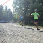 Men&rsquo;s 5K race winner Tony Eskelin (right) beats runner-up Ken Youngberg to the finish Saturday morning at the Run for the River 5K/10-mile races near Soldotna Creek Park. (Photo by Joey Klecka/Peninsula Clarion)