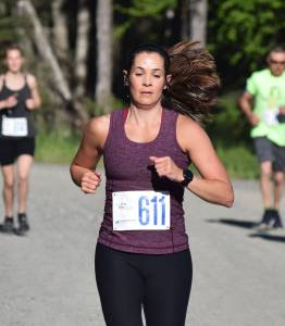 Jodi Hanson sets a pace in the women&rsquo;s 10-miler Saturday morning at the Run for the River 5K/10-mile races near Soldotna Creek Park. (Photo by Joey Klecka/Peninsula Clarion)