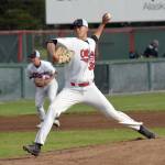 Oilers starter Christian Winston delivers home against the Anchorage Bucs on Monday, June 11, 2018, at Coral Seymour Memorial Park in Kenai. (Photo by Jeff Helminiak/Peninsula Clarion)