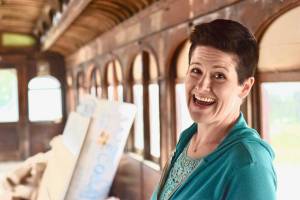 Chef Maya Wilson inside the Addie Camp train car on Tuesday, June 12, 2018, in Soldotna, Alaska. The 1913 train car is being refurbished as an intimate dining room for Soldotna&rsquo; newest restaurant Addie Camp Dining Car eatery and wine bar, which has plans to open this October. (Photo by Victoria Petersen/Peninsula Clarion)