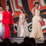 A models displays designers Jason Brown and Donna Decontie-Brown&rsquo;s work at the Native Fashion Show at Centennial Hall on Friday, June 8, 2018. (Michael Penn | Juneau Empire)
