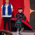 McKayla Paul participates with her mother in the Toddler Fashion Show on the main stage at Centennial Hall for Celebration 2018 on Friday, June 8, 2018. (Michael Penn | Juneau Empire)