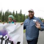 Brooks Banker, director of community engagement and youth programming at the Anchorage-based Identity, participates in the Two Spirit Pride March celebrating LGBTQ Pride. (Photo by Erin Thompson/Peninsula Clarion)